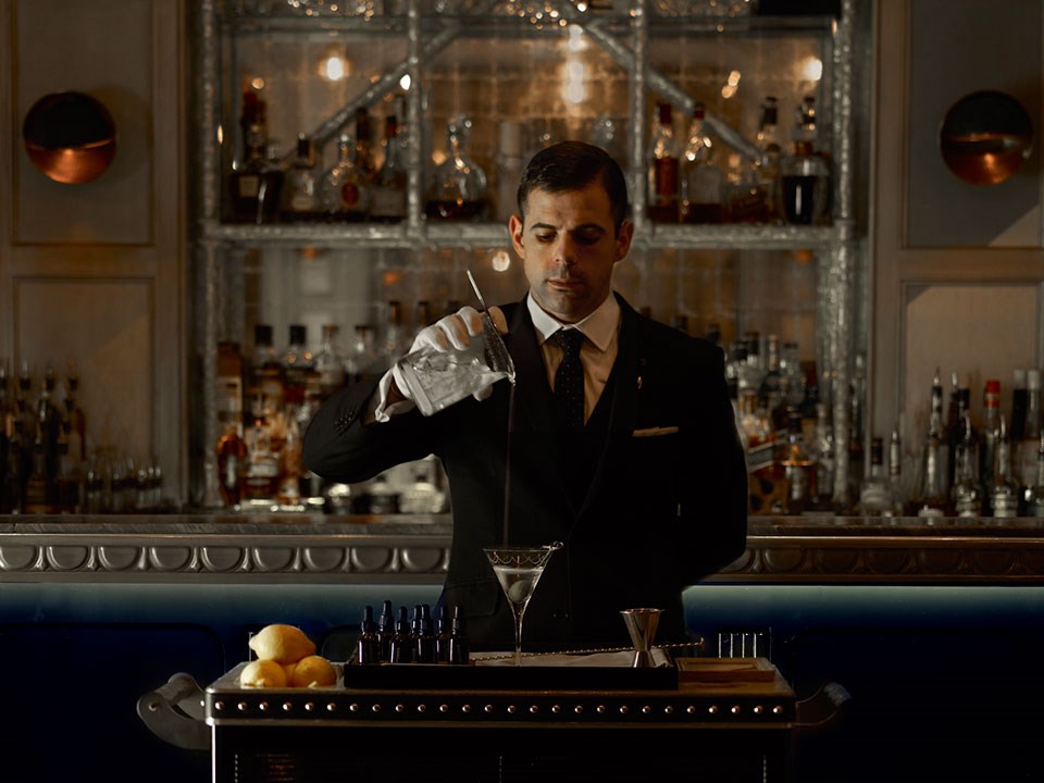 Focused mixologist, Agostino Perrone, in preparation of The Connaught Bar Gin.