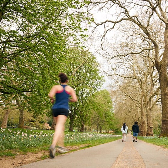 woman running through hyde park