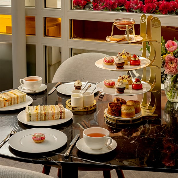 Spring Afternoon Tea spread at The Connaught, with tea, sandwiches, scones, and desserts.