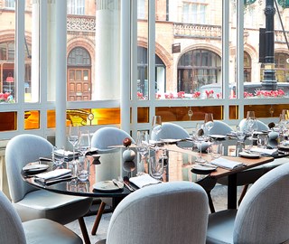 A large table set up at Jean-Georges at The Connaught.