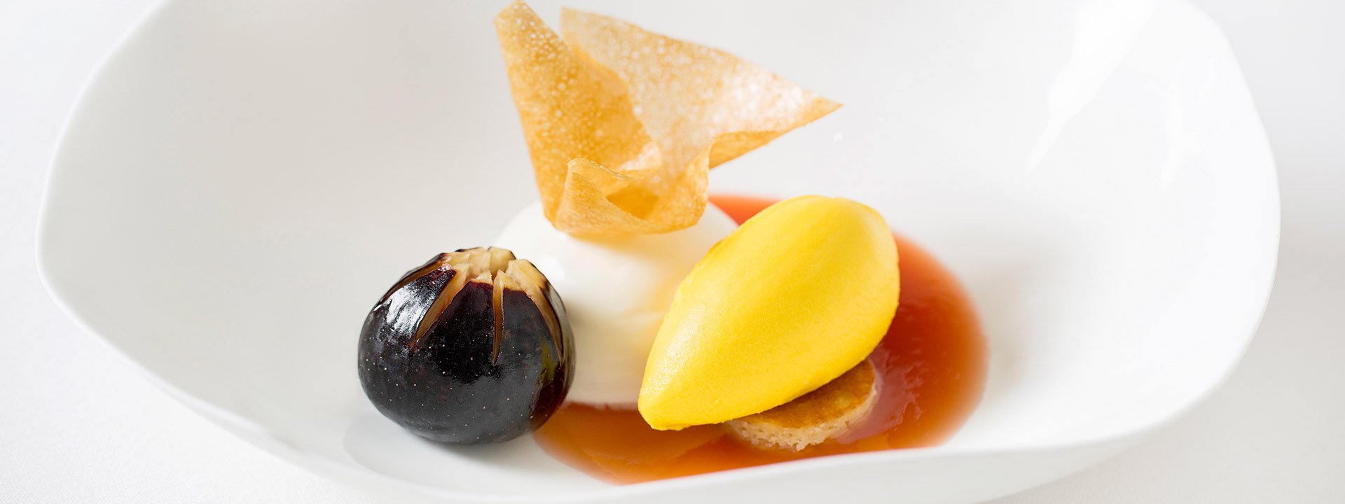 A fine white bowl with a dessert.