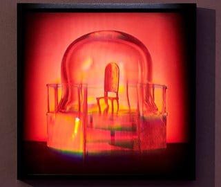 In the Red Room at The Connaught, an artwork by Louise Bourgeois called Plate 8, a hologram.