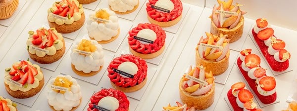 A selection of cakes of different shapes and colours at the Connaught Patisserie