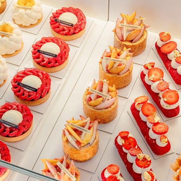 A collection of cakes of different shapes and colours at The Connaught Patisserie