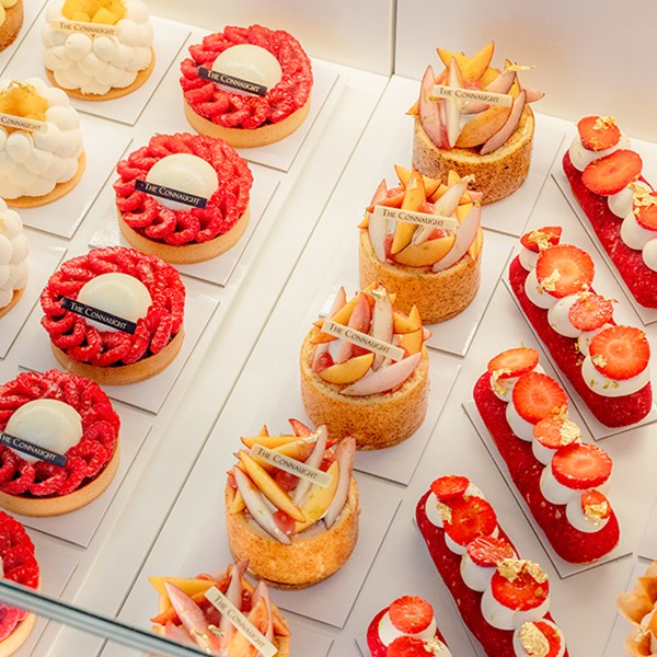 A collection of cakes of different shapes and colours at The Connaught Patisserie