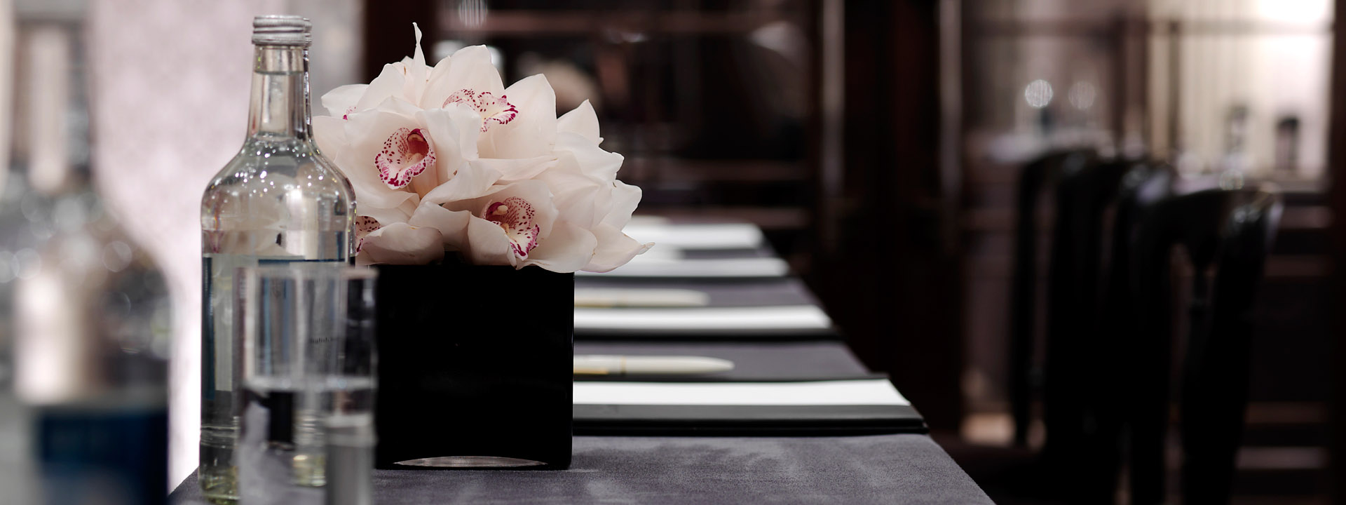 Presentation of the flower arrangement on the table, in one of the rooms suitable for a business event in The Connaught.