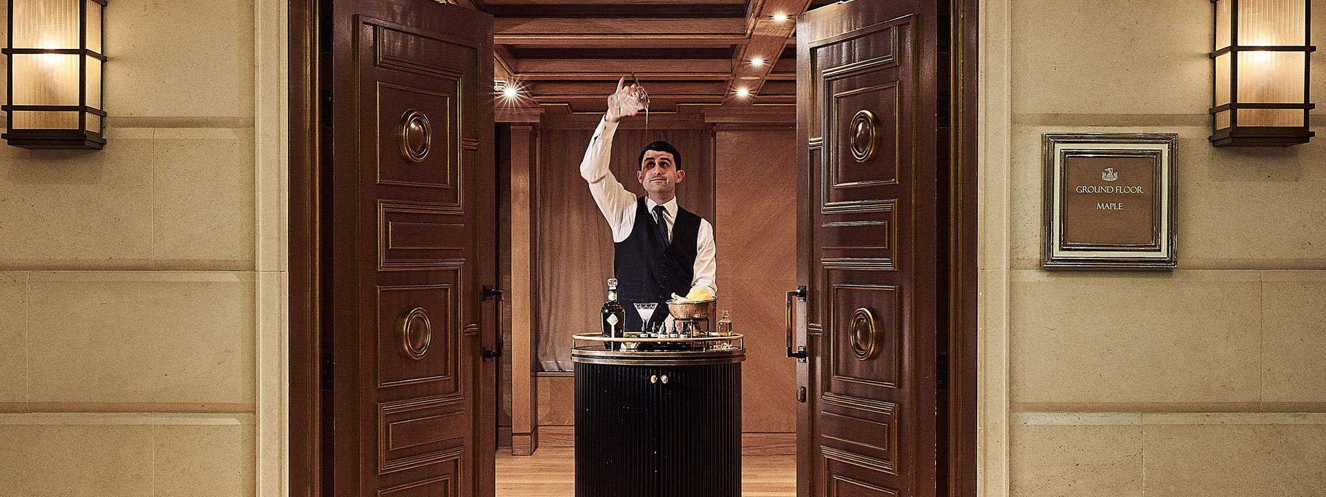 A display of a cocktail master making drinks in the Maple Room at The Connaught, for all ceremonies required.