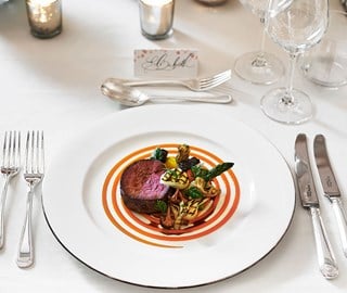 White plate with beef served at Jean-Georges at The Connaught in Mayfair