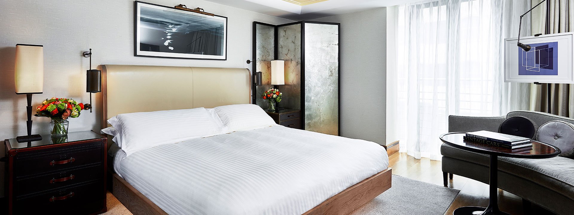 A view of the modern classic bedroom interior with a King Bed in the Contemporary Deluxe Room.