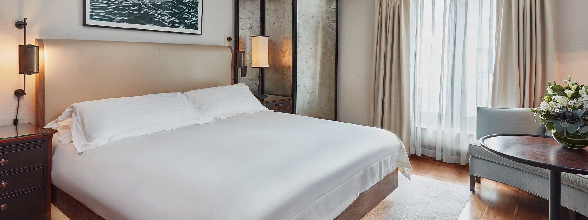 Bedroom in the Contemporary Superior Room, featuring one King Bed and the warmth of space.