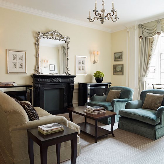 Plasterwork ceilings with mirrors and chandeliers transport you to an 18th-century drawing room from the Grosvenor Suite.