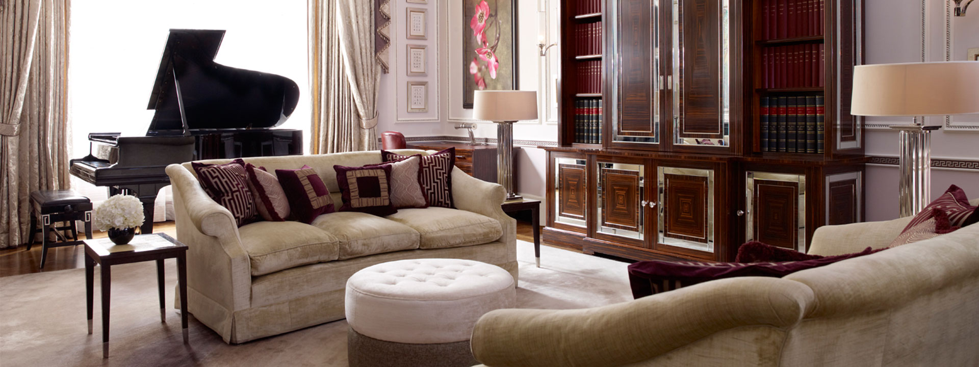 A view of the living room with hand-carved furniture from Italy and France in the Sutherland Suite.