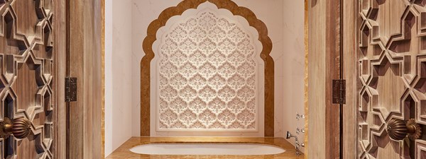 Bathroom of The King's Lodge with scalloped detailing and a white decor