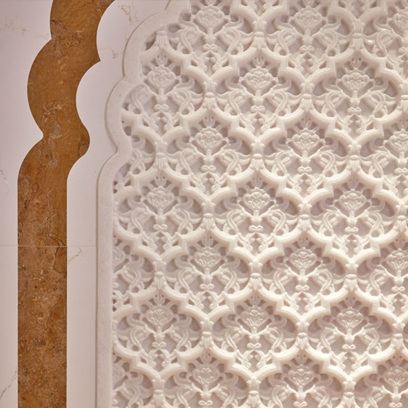 Close up of scalloped detailing on the wall of The King's Lodge