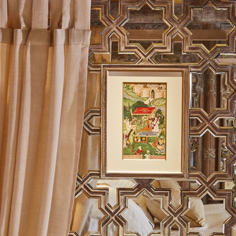 Close up of wooden detailing and hanging artwork